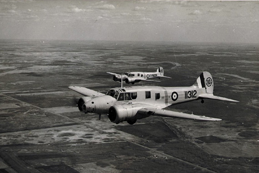 arms_air_training_prog_5 Two Avro Anson II from No 10 Service Flying Training School, Dauphin, Manitoba, 26th August, 1944.