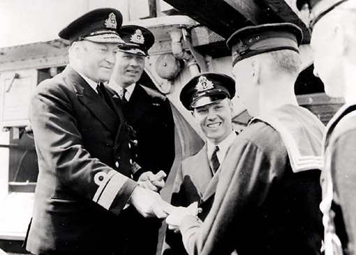 people_canada_murray On 29 July 1942, Rear Admiral L.W. Murray is presenting awards to crew members of destroyer HMCS St. Croix, which sank enemy submarine U-90 on 24 July 1942.